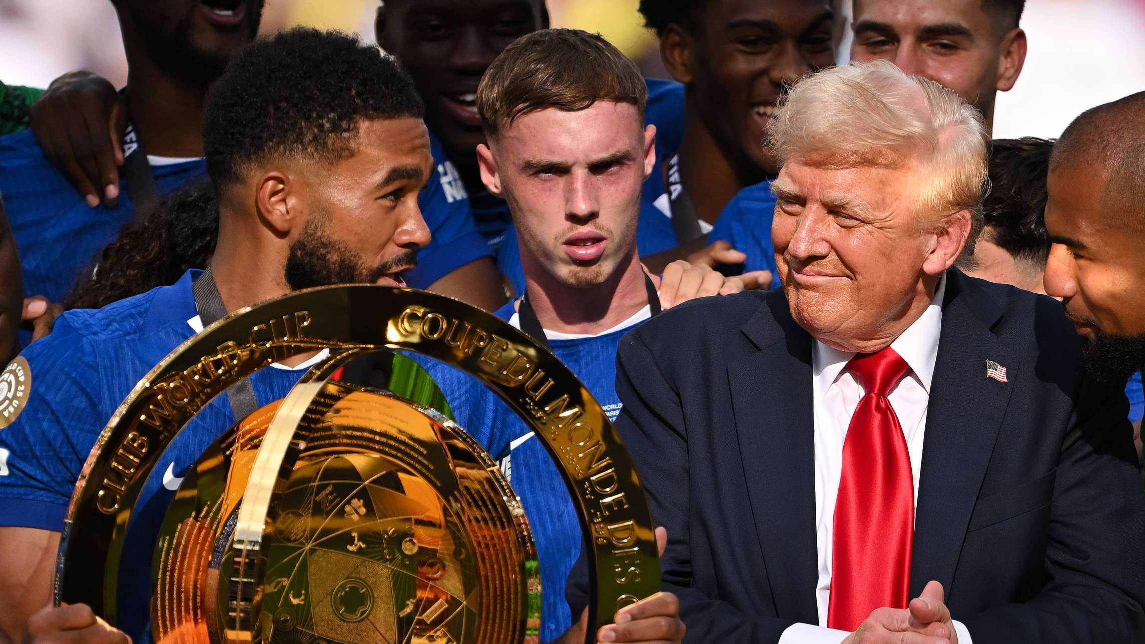 Palmer admits to being baffled by Trump's presence on trophy podium  