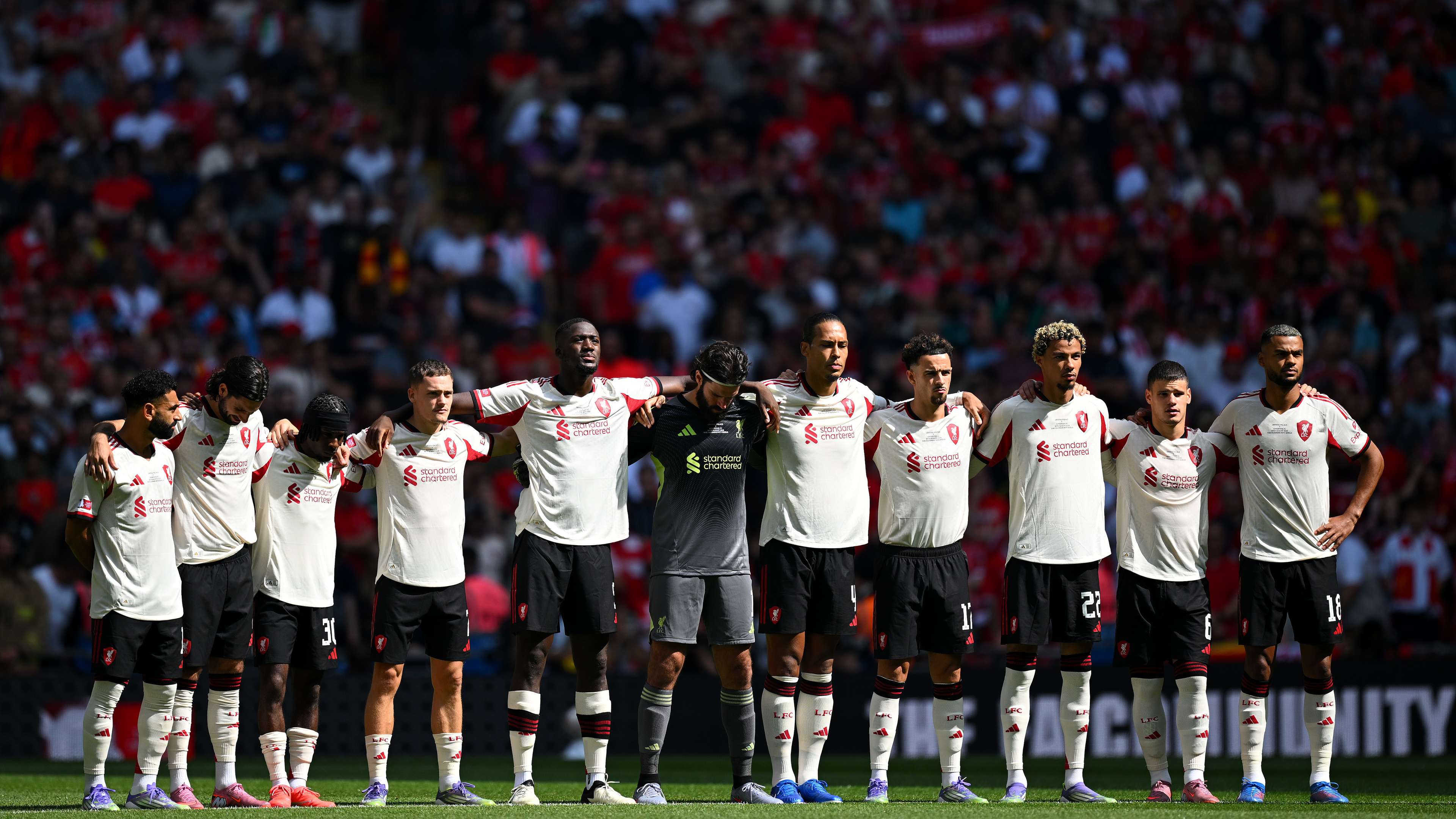 Minute's silence cut short after fans boo during Jota tribute  