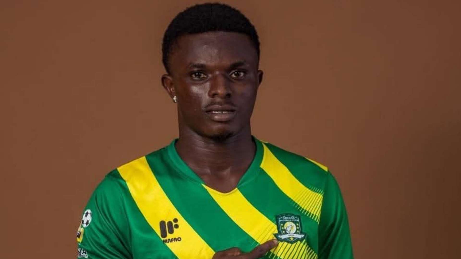 Footballer dies after 'masked men wielding guns’ attack bus  