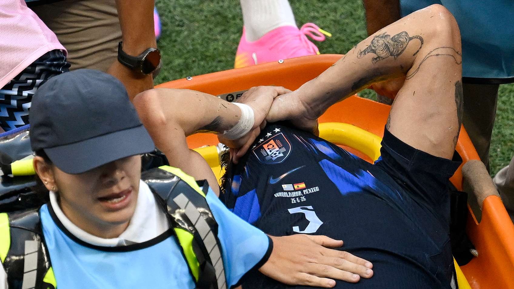 Ugarte suffers horrible knee injury after colliding with Uruguay team-mate  